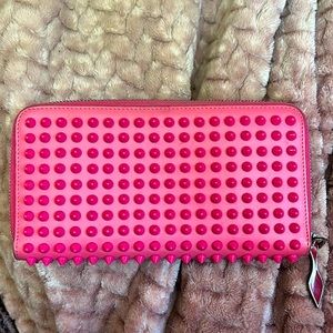 Pink studded Christian Louboutin wallet